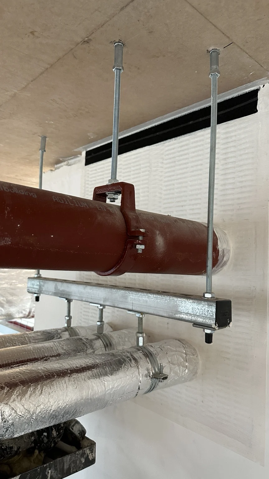 Fire stopping detail around service penetration