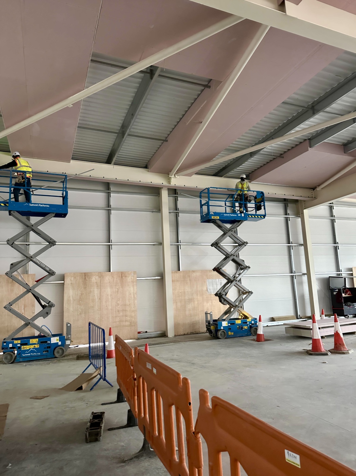 INTUMEX site team working from access platforms on an industrial project